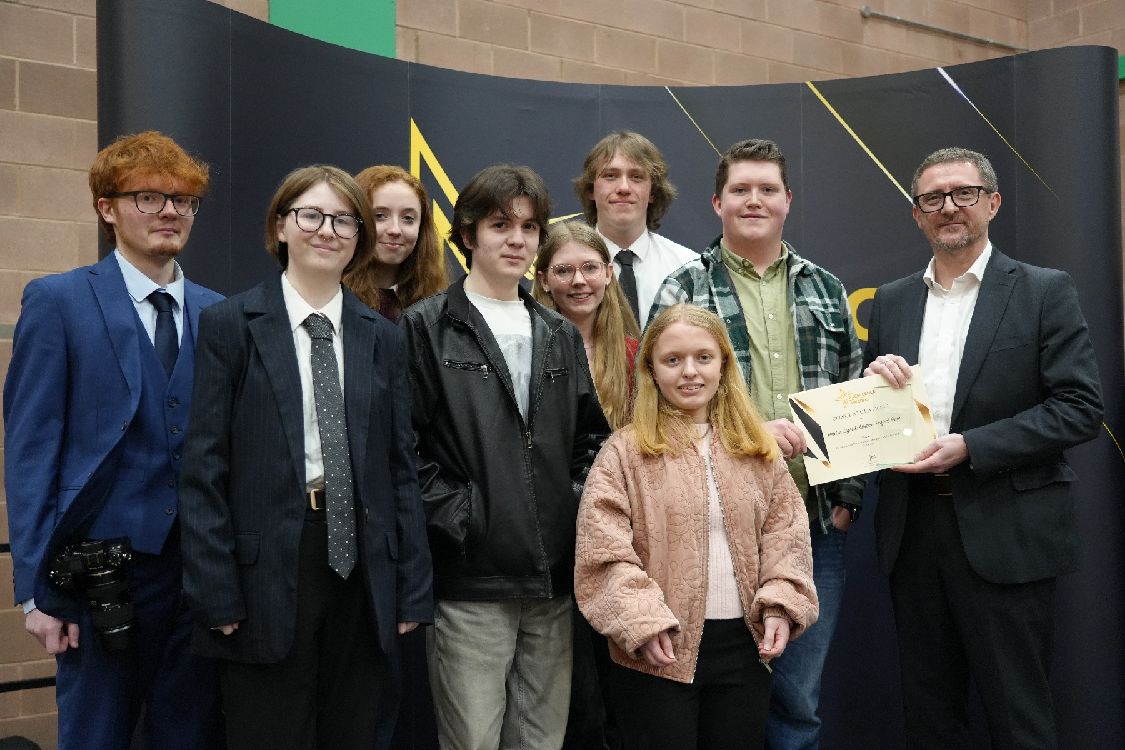 Held in Light exhibition team – Caitlin Crossley, Callum Maynes, Erin Thompson, Holly Martin, Jess Sloan, Joshua Madden, Lauren-Lucy Tully, and Dean Collins from the Level 3 Technical Diploma in Art & Design (Photography) - Excellence in Project Work (Bangor Campus) with Tommy Martin.